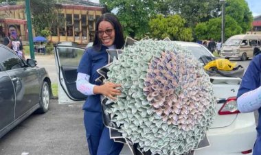 UNICAL Graduating Nursing Student Receives a Bouquet of Money From her Partner