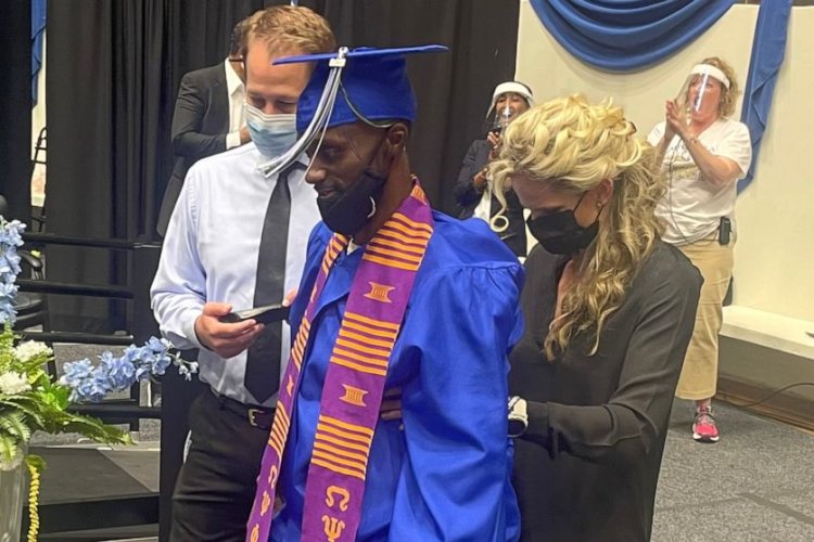 Triumph Over Adversity: Paralyzed Man Walks Across Stage to Receive ...