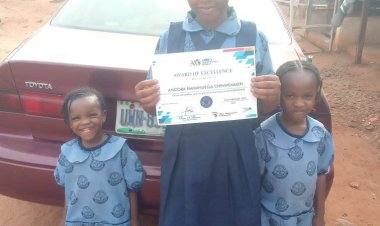 Twin Daughters Receive Mathematics Excellence Awards at UNN Schools