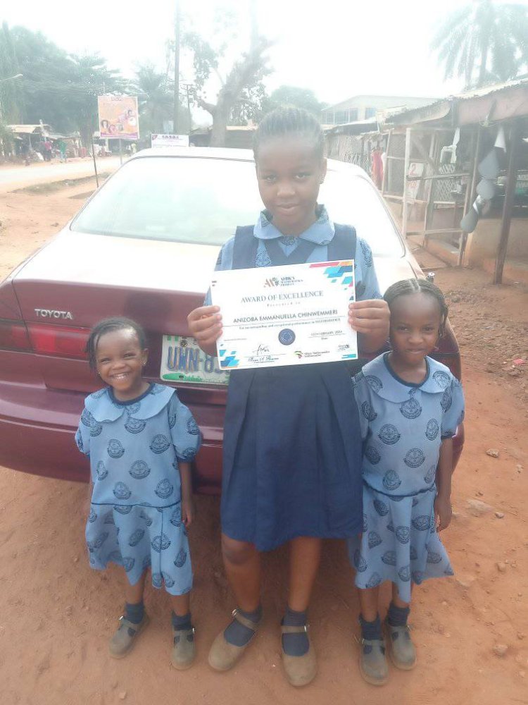 Twin Daughters Receive Mathematics Excellence Awards at UNN Schools