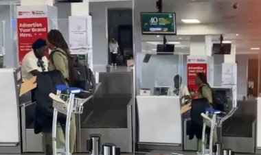 Viral Video: Lady Signs Out  From NYSC , Spotted Leaving The Country with NYSC Uniform