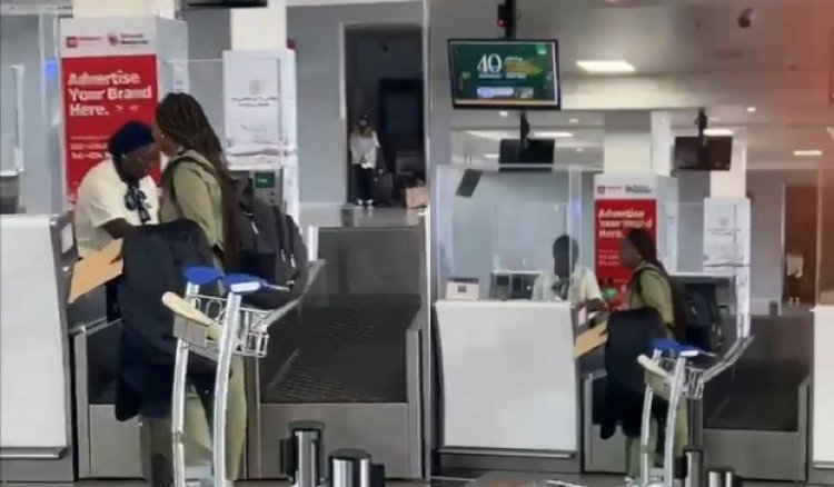 Viral Video: Lady Signs Out  From NYSC , Spotted Leaving The Country with NYSC Uniform