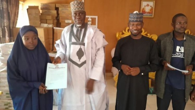 Hon. Maisudan Presents Admission Letters and Scholarships to Suru Students