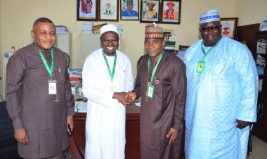 FULafia Vice-Chancellor Congratulates Bursar on Doctorate Achievement