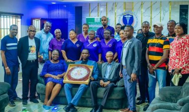 UNIMEDTH Health Attendants Honour CMD with Customized Wall Clock