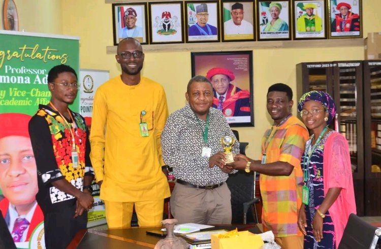 FULafia Students Present NSM Quiz Competition Prize to Management
